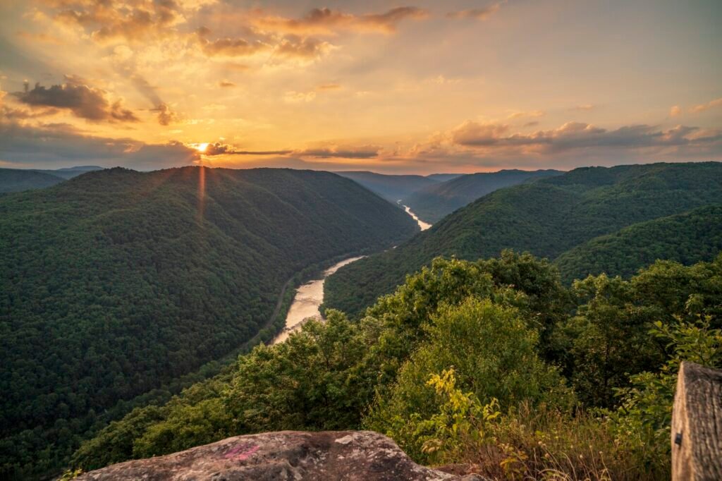 Nature Walks as an Unplugging Habit: 7 Proven Ways to Boost Your Mental Clarity Serene forest landscape at sunset, perfect backdrop for unplugging habits through mindful nature immersion.