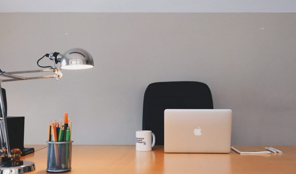 Blog Minimal workspace scene expressing balance technology use and reclaiming personal life through intentional unplugging.
