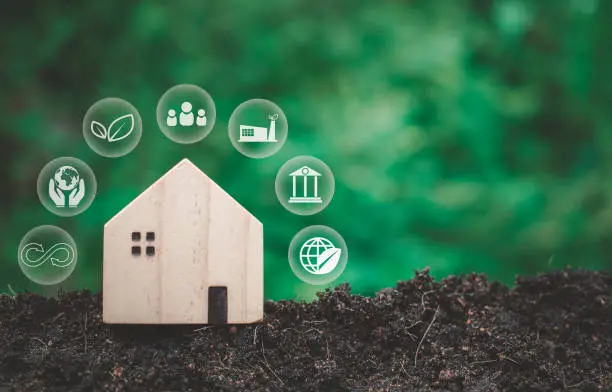 Community Initiatives: 7 Powerful Ways to Support Sustainable Living “Hand holding a light bulb with an ESG (Environmental, Social, and Governance) icon concept, symbolizing community initiatives for sustainable and ethical business practices.”